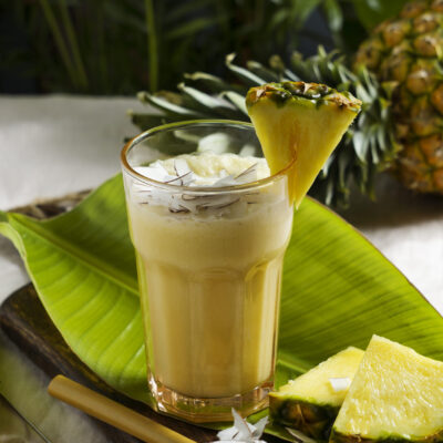 delicious-pina-colada-cocktail-with-leaves delicious-pina-colada-cocktail-with-leaves